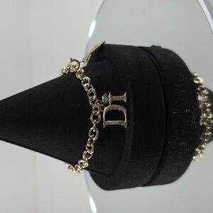 Diamonds International Gold Charm Bracelet